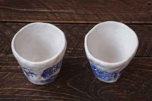white blue set of coffee mugs